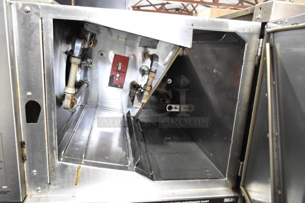 Giles GVH-C stainless steel ventless recirculating hood system interior, showing electrostatic air cleaner components.