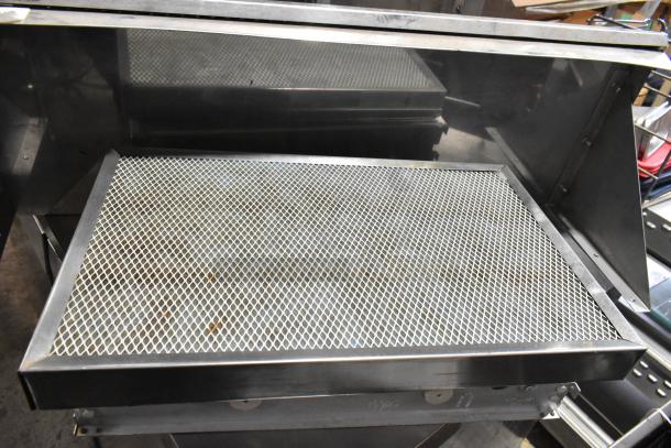 Giles GVH-C ventless hood system, stainless steel, electrostatic air cleaner, two commercial fryers, 208-240V, good condition.