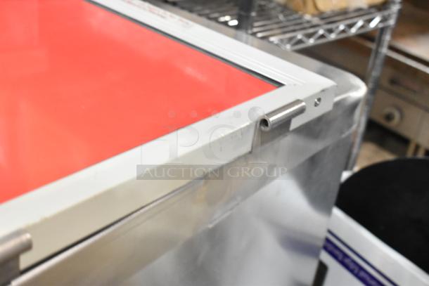 Brand new Avantco 177HTIS1812 undercounter insulated heated holding cabinet. Features solid door, commercial casters. Minor dents visible.