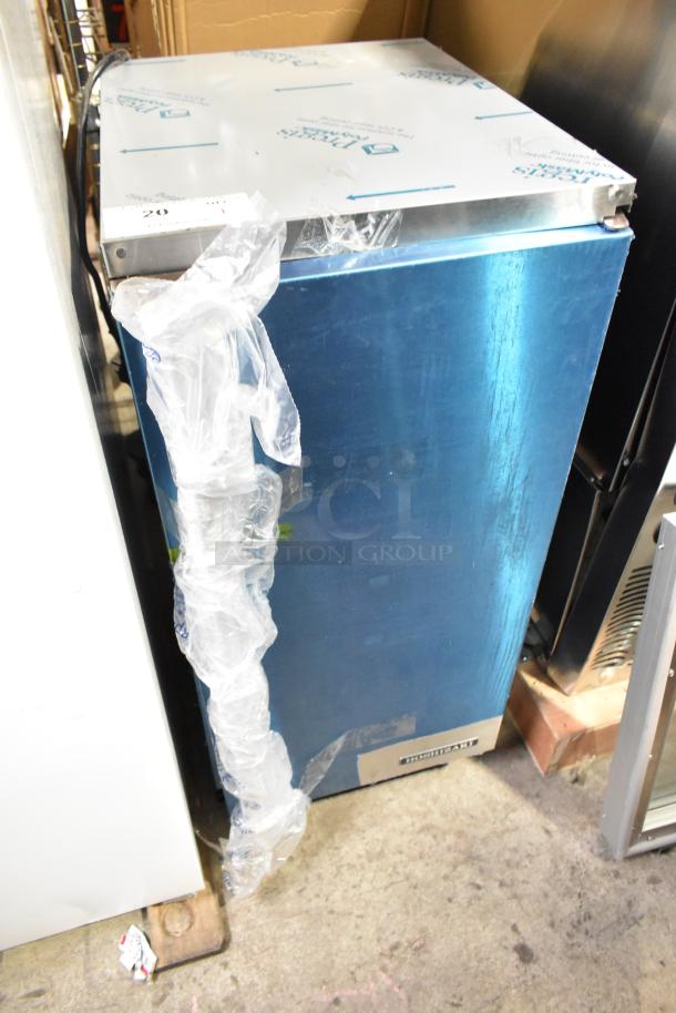 Brand new 2025 Hoshizaki AM-50BAK undercounter ice machine, 54 lb. capacity, minor scratches, protective wrap partially intact.