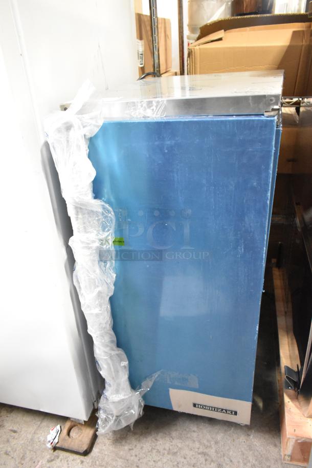 2025 Hoshizaki AM-50BAK undercounter ice machine, 27 lb. bin, brand new with minor scratches, labeled, wrapped in plastic.
