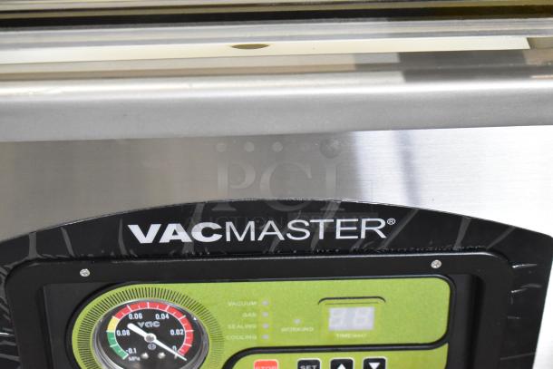 Vacmaster VP215 Stainless Steel Chamber Vacuum Sealer with control panel and Vacmaster branding. 120 Volts, 1 Phase.
