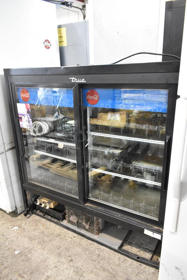 2017 True GDM-41SL-48-HC-LD 2-door reach-in cooler with glass doors, poly-coated racks, and Coke branding. 115 Volts.