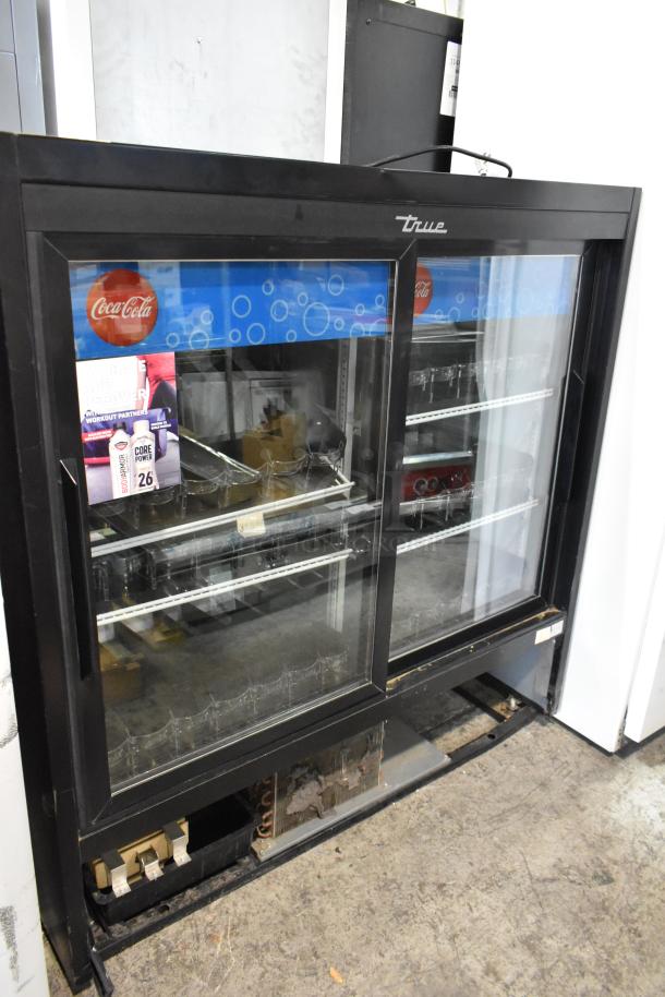 2017 True GDM-41SL-48-HC-LD metal commercial 2-door cooler with poly coated racks, visible Coca-Cola branding.