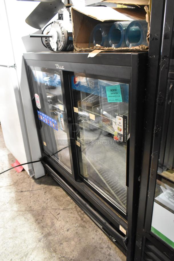 2017 True GDM-41SL-48-HC-LD 2-door reach-in cooler, metal frame, poly-coated racks, 115V, visible condition with labels.