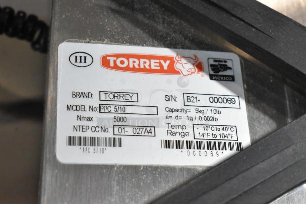 Brand new Tor Rey PPC-5/10 digital scale, 10 lb. capacity, includes remote indicator and foot pedal. Scratch and dent.