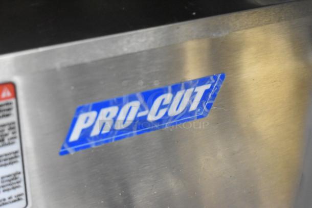Brand new Pro-Cut KG-12-SS stainless steel meat grinder, 115V, 1-phase, blue Pro-Cut label, minor scratches visible.