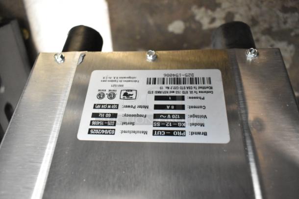 Brand new Pro-Cut KG-12-SS stainless steel meat grinder, electric, 115V, 1 Phase. Features model and voltage labels.