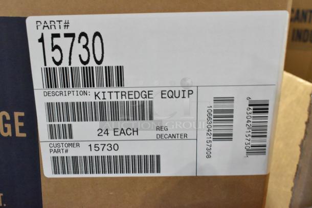 15 brand new Kittredge 15730 scratch and dent decanter boxes, one incomplete. Box label shows part number and description.
