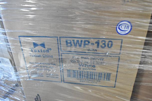 28 new boxes, including Tuxton BWP-130 Fry Pan Server. Visible labels: "Tuxton China," "BWP-130," "White, 6 pcs/ctn." Plastic-wrapped.