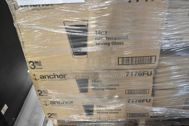 Sealed pallets of Anchor tempered glass boxes, featuring 14oz and 16oz mixing glasses, brand new condition.