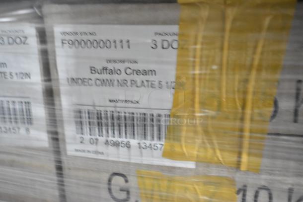 Boxes labeled "Buffalo Cream UNDEC CWW NR PLATE 5 1/2IN" with barcode and vendor info, wrapped and ready for auction.
