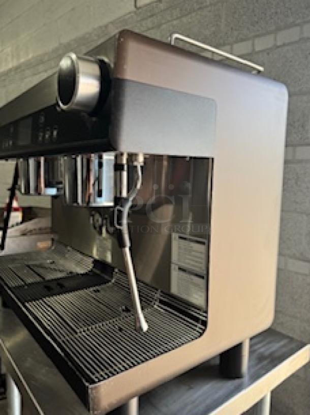 WMF Espresso Model 30.5500 with dual grinders, hot water outlet, and 2 steam wands. Tested, working, and suitable for 8-16oz cups.