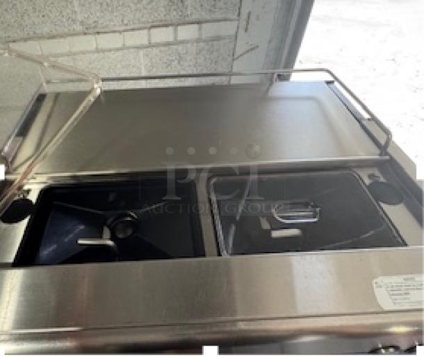 WMF Espresso Model 30.5500 machine with dual grinders and steam wands, shown with transparent hopper lids.