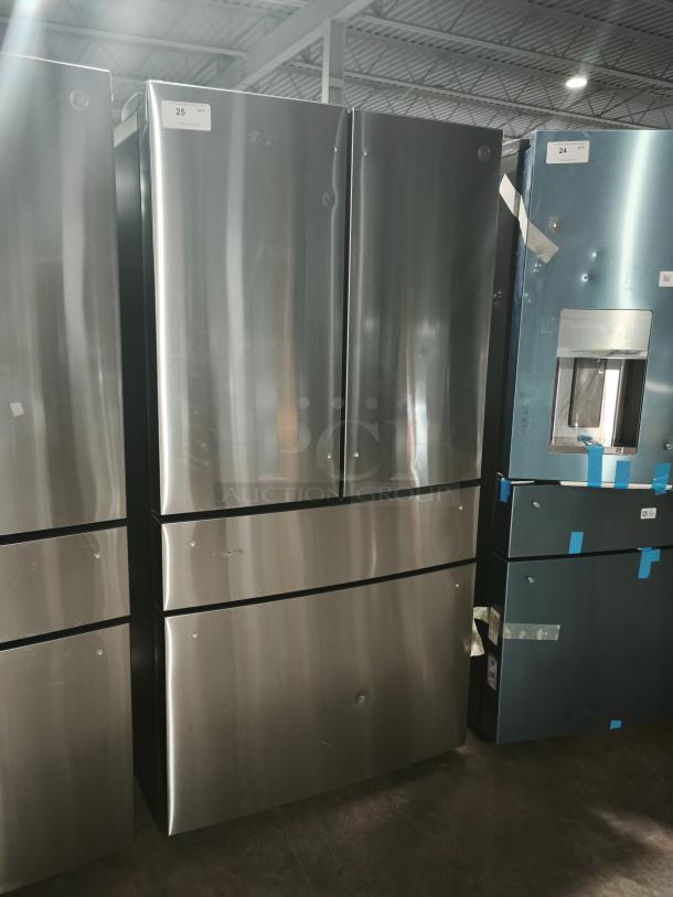 GE Profile™ 28.7 cu ft Smart Fingerprint-Resistant 4-Door French Door Refrigerator, model PGE29BYTFS. Slight dent visible.