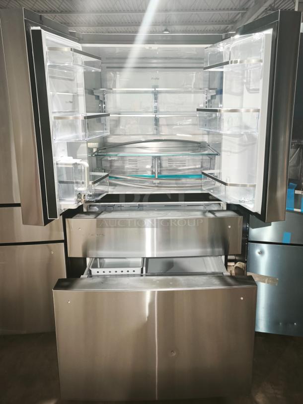 GE Profile™ 28.7 cu ft 4-Door French Door Refrigerator, Model PGE29BYTFS, stainless steel, fingerprint-resistant, open doors.