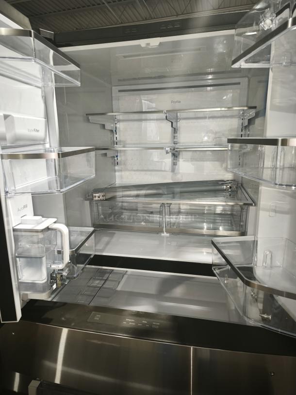 GE Profile™ 28.7 cu ft Smart 4-Door Refrigerator, model PGE29BYTFS, fingerprint-resistant, AutoFill pitcher, pristine condition.