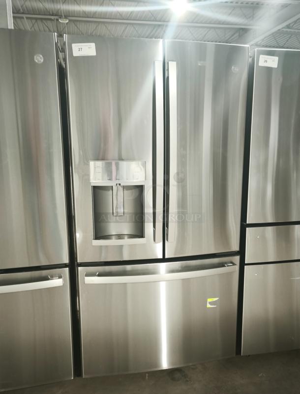 GE 27.7 Cu. Ft. stainless steel French-door refrigerator, model GFE28GYNFS. Fingerprint-resistant, sleek design, excellent condition.