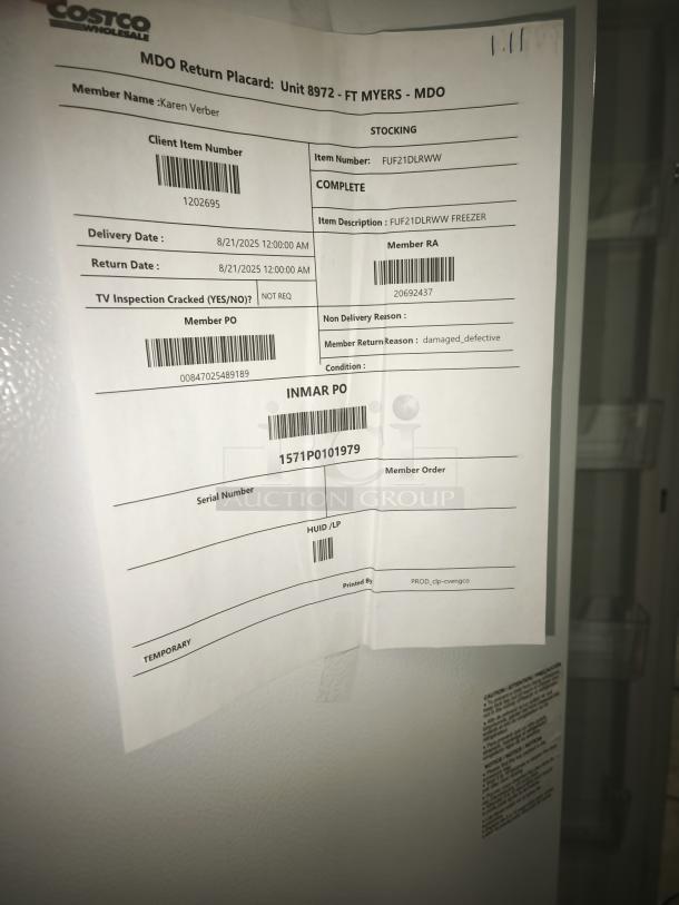 GE 21.3 Cu. Ft. Upright Freezer, Model GFE28GYNFS, frost-free, garage ready, condition noted as damaged/defective, return paperwork shown.