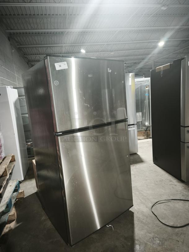 GE ENERGY STAR® 21.1 cu. ft. top-freezer refrigerator, model GIE21GSHSS. Stainless steel finish, slightly used condition.