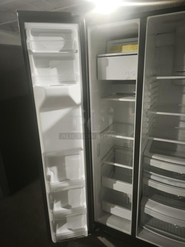 GE 21.8 cu ft counter-depth side-by-side refrigerator, model GZS22IYNFS, fingerprint-resistant, interior view.