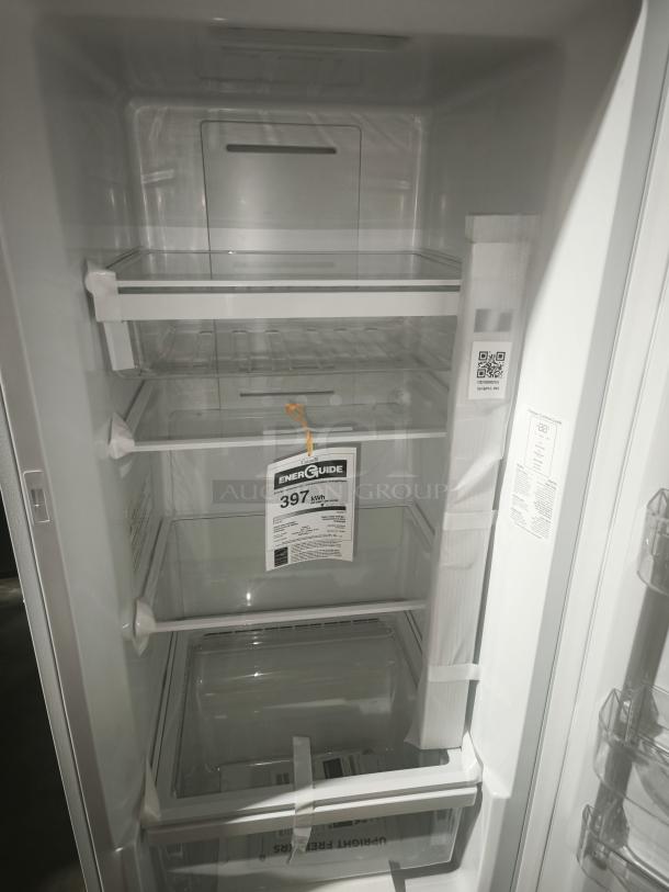 GE 14.1 Cu. Ft. Frost-Free Garage-Ready Upright Freezer, model FUF14DLRWW, with adjustable shelves, energy guide, new condition.