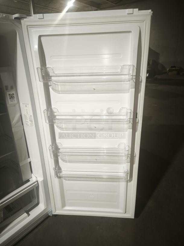 GE FUF14DLRWW upright freezer, 14.1 Cu. Ft., frost-free, garage-ready, inner door shelves, excellent condition.