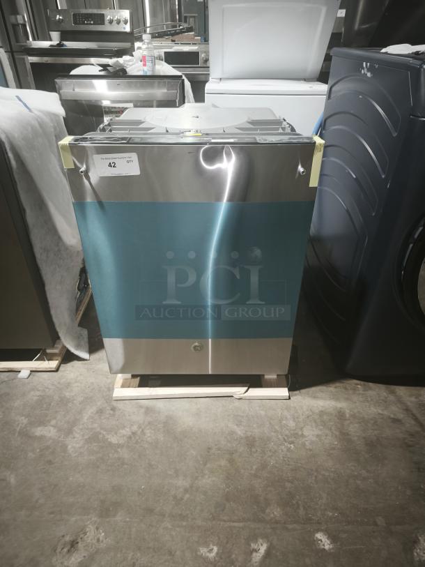 Brand new scratch and dent GE dishwasher, model GDT665SSNSS, with Energy Star rating, sanitize cycle, and Dry Boost™.
