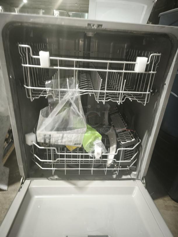 BRAND NEW SCRATCH AND DENT GE GDT665SSNSS dishwasher with sanitize cycle, Dry Boost™, plastic interior, top control.
