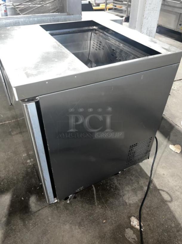 BERG BERS27 8 Pan 1-Door Sandwich Prep Table, stainless steel, durable, efficient. Model label visible. Ideal for kitchens.