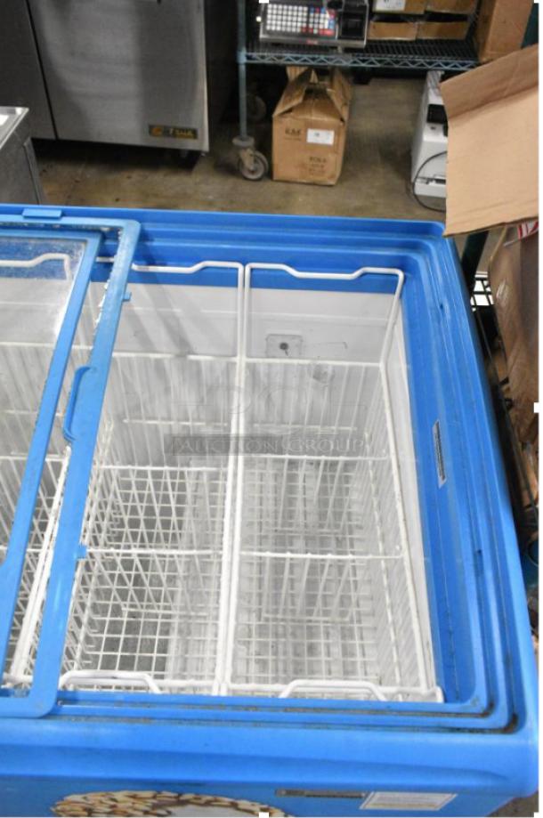 AHT RIO S 100 commercial chest freezer on casters, missing right-side glass pane. 115V, 1 Phase, tested and working.