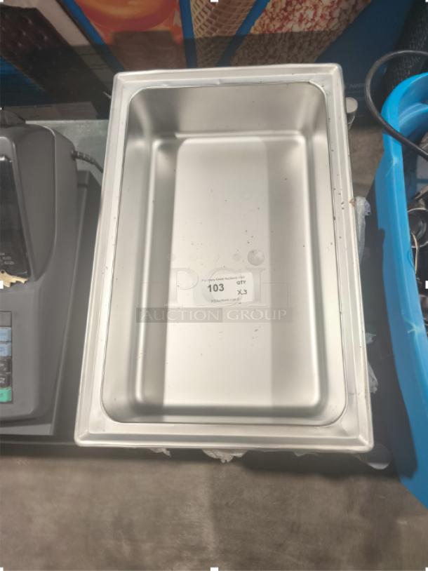 Brand new stainless steel full-size hotel pan, 4" deep, with a label indicating quantity and product code.