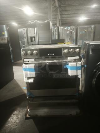 New GE Café 30" Smart Slide-In Range, Model CES700P2MS1, with radiant and convection features; pristine condition.