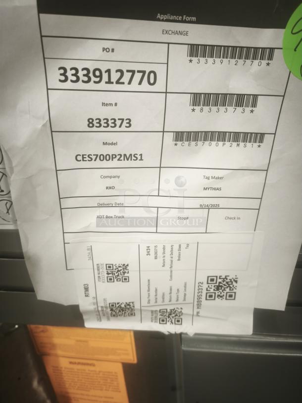 GE Café 30" Smart Slide-In Range, model CES700P2MS1. Features radiant and convection cooking. New condition. Labels indicating exchange process, item number 833373, and PO 333912770 visible.