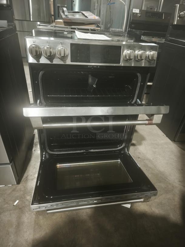 GE Café 30″ Smart Slide-In Induction/Convection Double-Oven Range, Model CHS950P2MS1, in new scratch and dent condition.