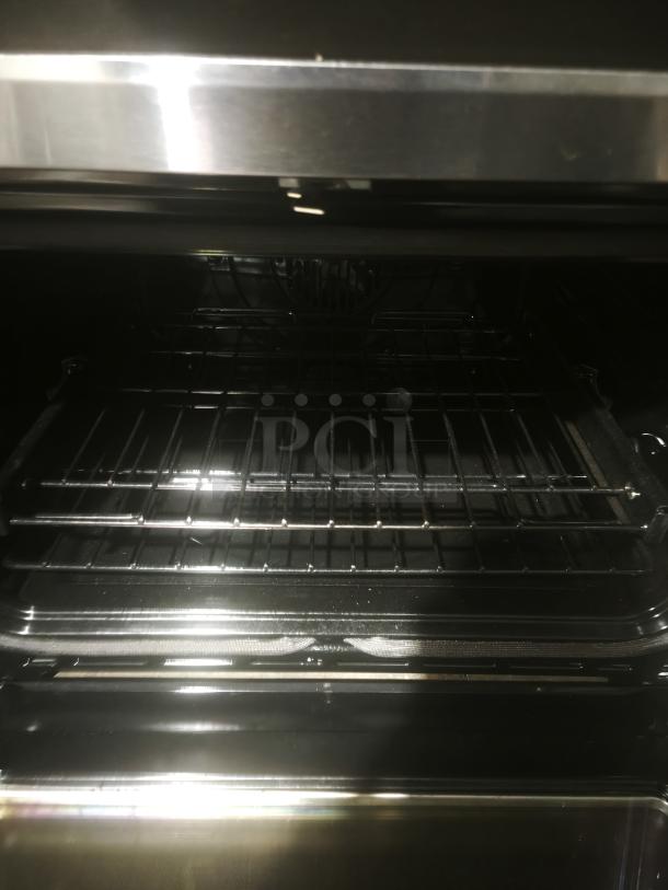 GE Café 30″ induction and convection double-oven range, model CHS950P2MS1. Brand new, scratch and dent. Front-control design.