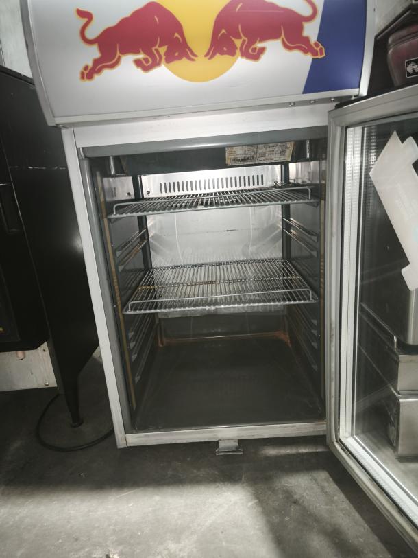 Red Bull VV3 LED single door mini display cooler, features glass door, two wire shelves, Red Bull branding, good condition.