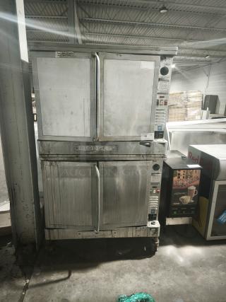 Blodgett EF-111 electric full-size convection oven, stainless steel, EF Series, visible wear, on wheeled base, model label on front.