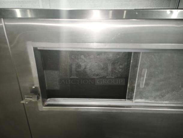 MGR SP-1650-SS ice storage bin, stainless steel, top view with sliding panel, in good condition.