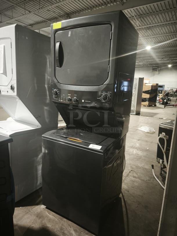 GE Unitized Spacemaker washer and dryer, model GUD27ESPM1DG, new condition, 3.8 cu ft washer, 5.9 cu ft dryer.