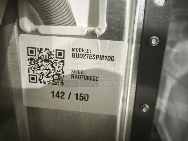 GE Unitized Spacemaker washer-dryer label showing model GUD27ESPM1DG, new condition. QR code and serial number visible.