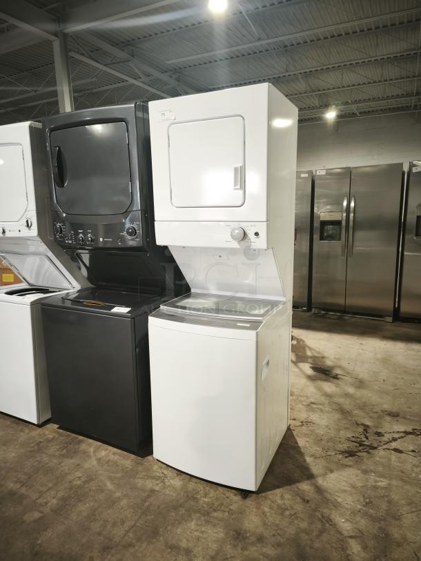 New GE Model WET4024HWO 1.6 cu ft electric stacked washer and dryer in white, compact design, pristine condition.