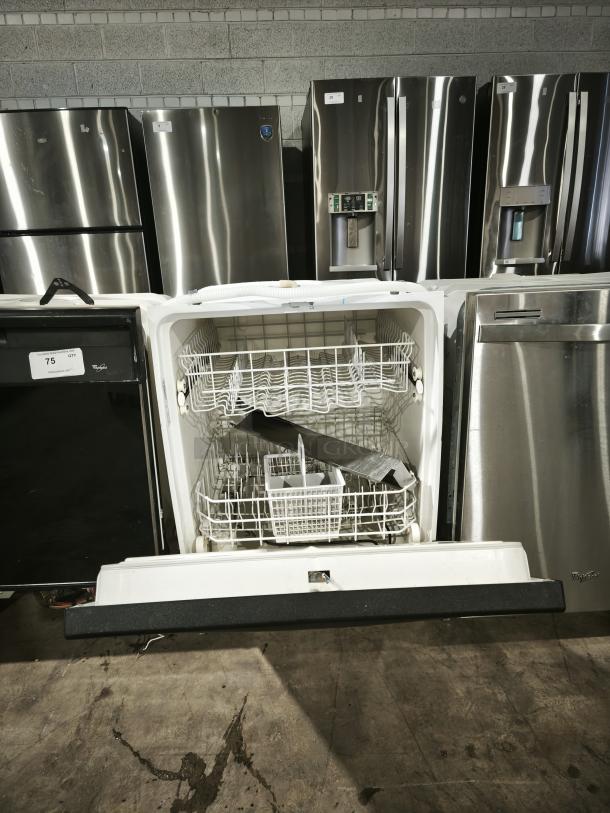 GE Built-In Full-Console Dishwasher, model gsd3960L00ss, open view showing racks, used condition, stored among appliances.