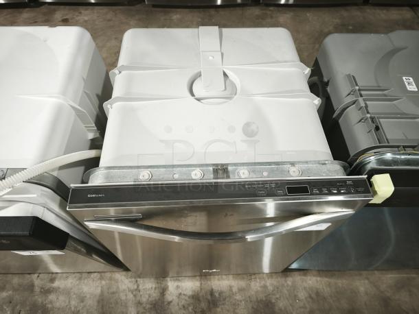 Whirlpool Gold 24" built-in dishwasher, model WDT720PADM2, in stainless steel. Features top controls, appears in used condition.
