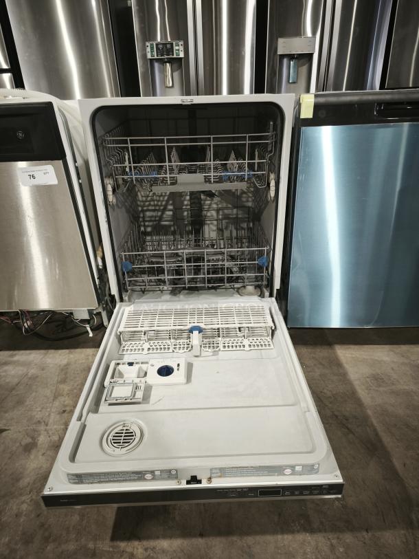 Whirlpool Gold 24" Tall Tub Built-In Dishwasher, Model WDT720PADM2, in open condition showing interior racks and controls.