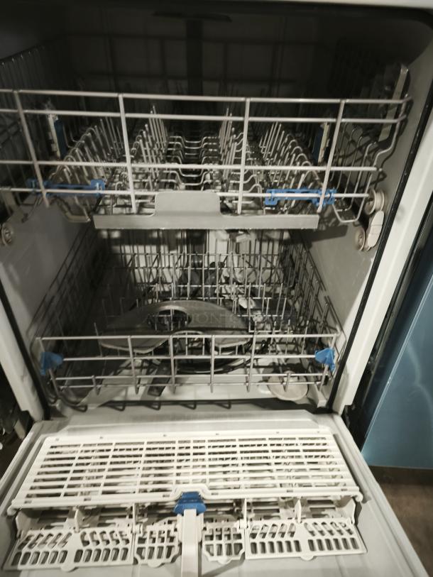 Whirlpool Gold 24" Tall Tub Built-In Dishwasher, model WDT720PADM2, features adjustable racks, stainless steel interior, excellent condition.