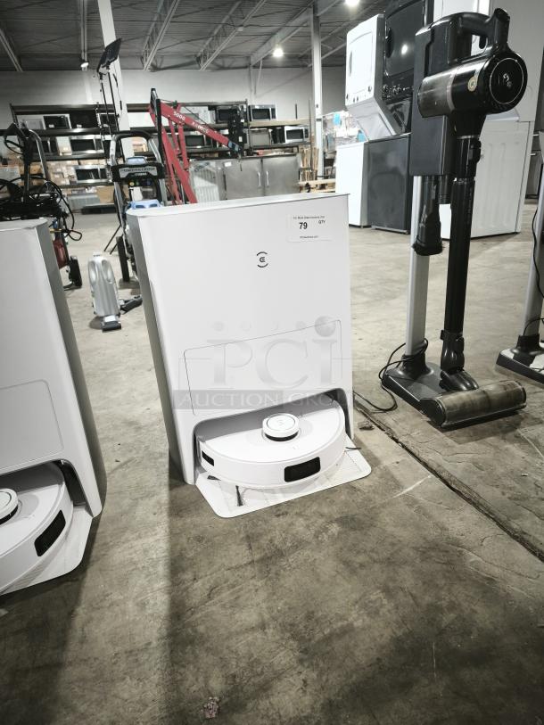 Ecovacs DEEBOT T10 OMNI Robot Vacuum & Mop, model CH2208, with auto-cleaning station, 5,000Pa suction, and camera vision.