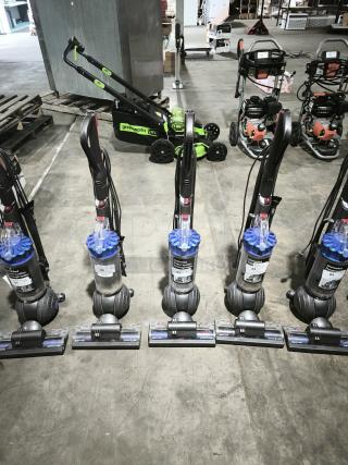 Five Dyson Ball Multi Floor 2 vacuums (Model UP19) with blue and gray design; used, labeled with numbers for auction.