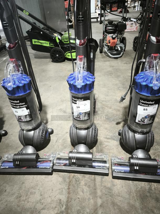 Dyson Ball Multi Floor 2 upright vacuum, model UP19, with Ball technology. Tags indicate models 83, 84, 85.