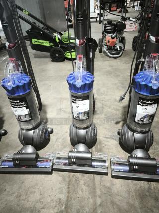 Dyson Ball Multi Floor 2 upright vacuum, model UP19, with Ball technology. Tags indicate models 83, 84, 85.